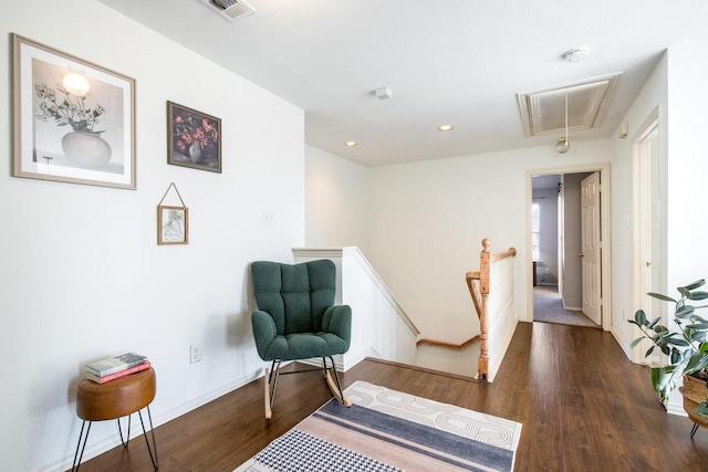 living area with dark hardwood / wood-style flooring