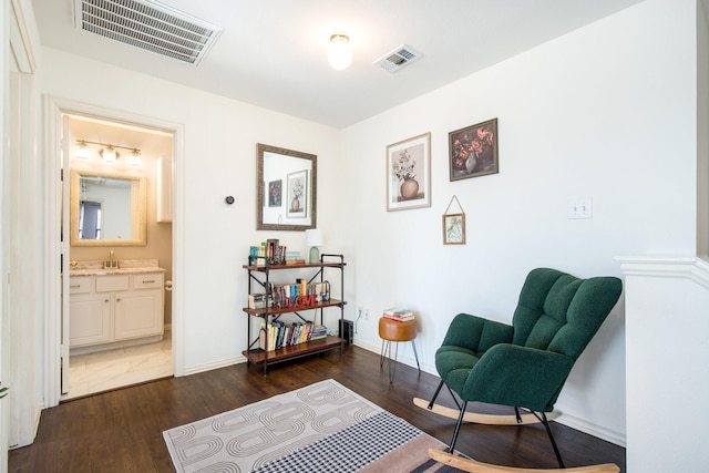 living area featuring dark hardwood / wood-style floors