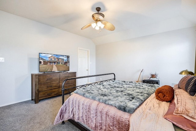 bedroom featuring lofted ceiling, ceiling fan, and carpet