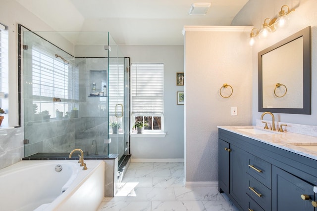 bathroom featuring plenty of natural light, independent shower and bath, and vanity