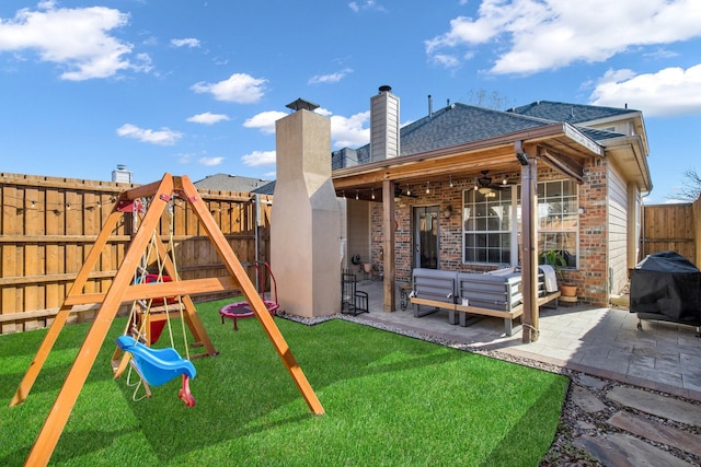 exterior space with a yard, a patio, and ceiling fan