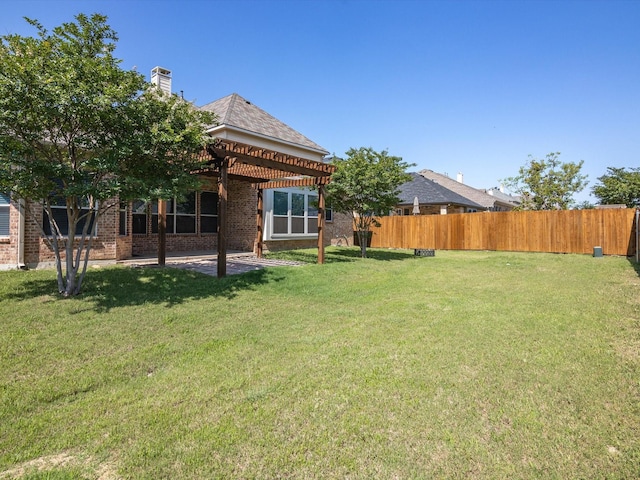 view of yard with a patio area and a pergola