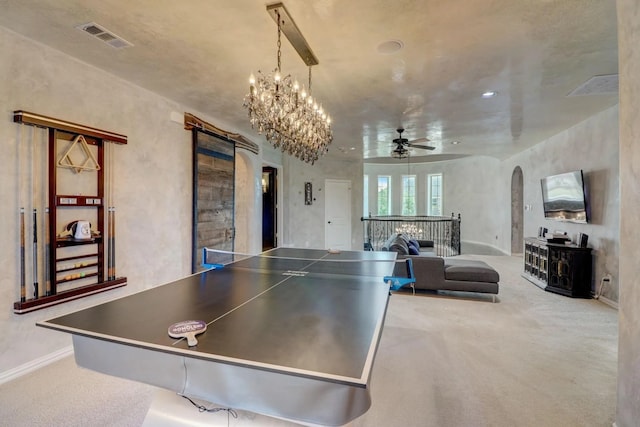 7281 Shingle Mill Rd, Frisco, TX 75036 - recreation room featuring arched walkways, carpet floors, ceiling fan, and baseboards