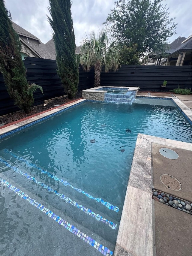7281 Shingle Mill Rd, Frisco, TX 75036 - view of swimming pool featuring a pool with connected hot tub