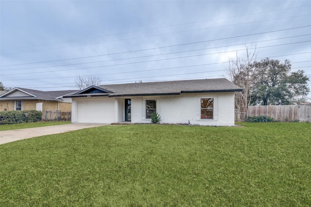 single story home with a garage and a front lawn