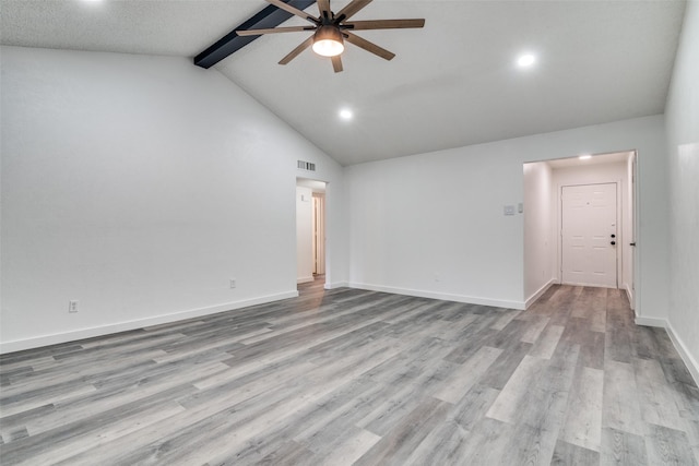 unfurnished room with ceiling fan, light hardwood / wood-style flooring, high vaulted ceiling, and beamed ceiling