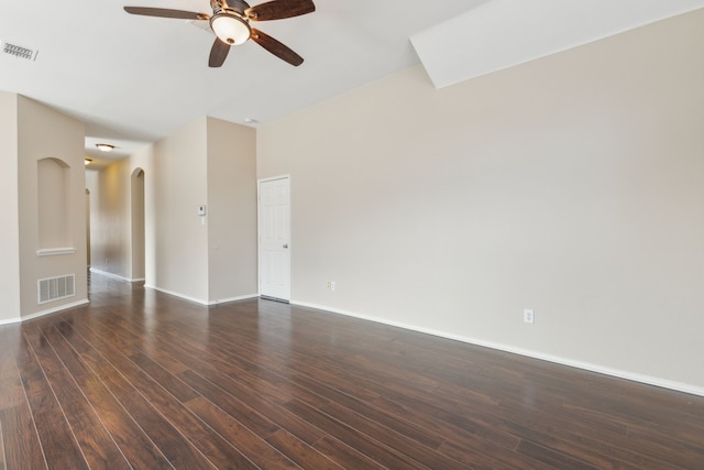 empty room with dark wood-type flooring and ceiling fan