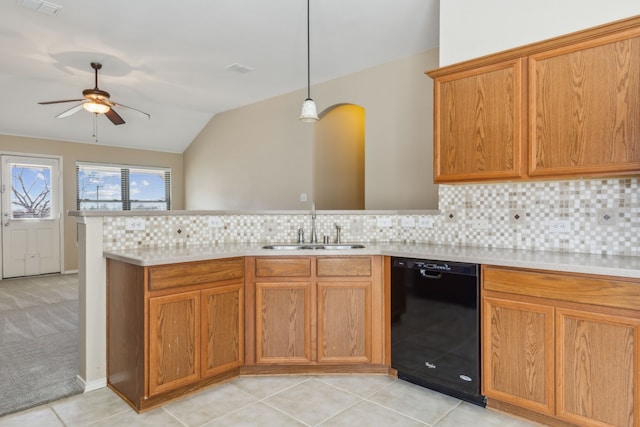 kitchen with vaulted ceiling, black dishwasher, sink, backsplash, and hanging light fixtures