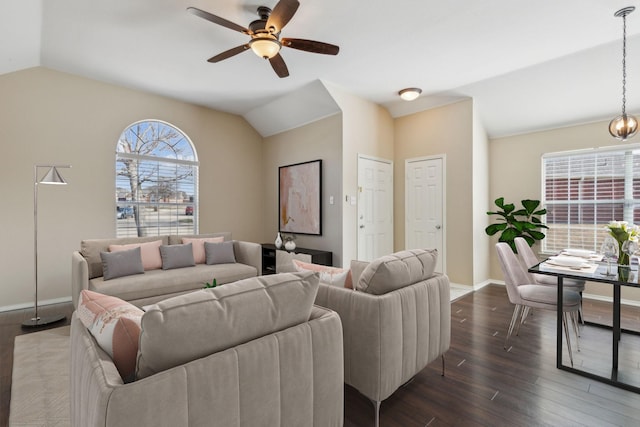 living room featuring ceiling fan, lofted ceiling, and dark hardwood / wood-style floors