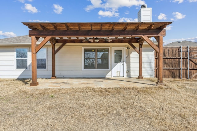 rear view of property featuring a patio area