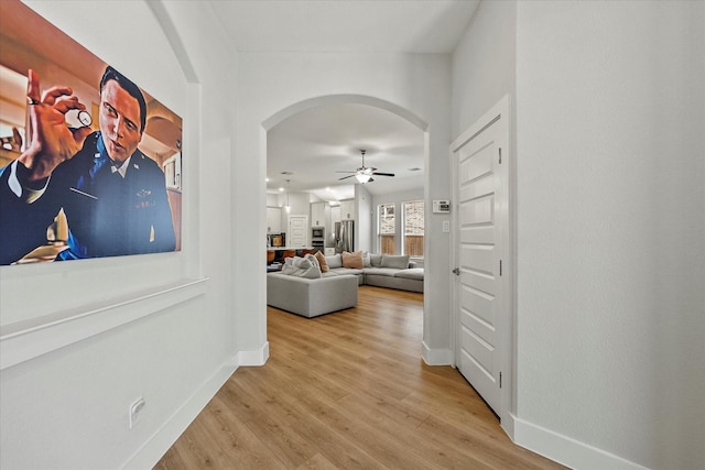 hallway featuring light hardwood / wood-style flooring