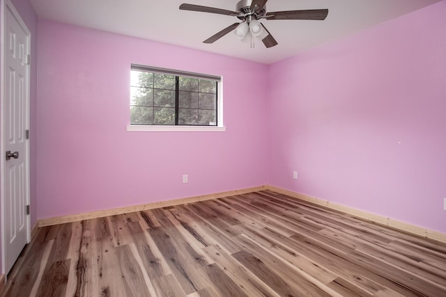 unfurnished room featuring ceiling fan and light hardwood / wood-style flooring