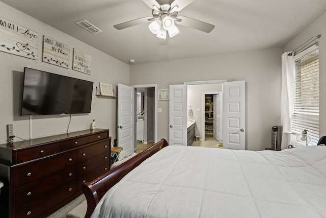 bedroom with light carpet and ceiling fan