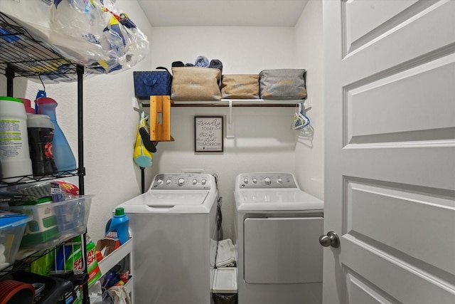 laundry room with washing machine and dryer