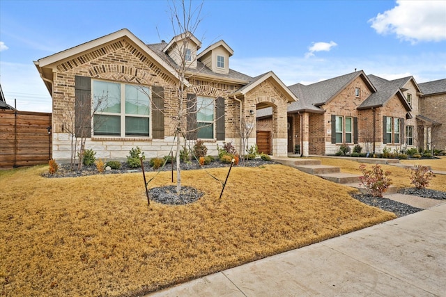 view of front facade with a front yard