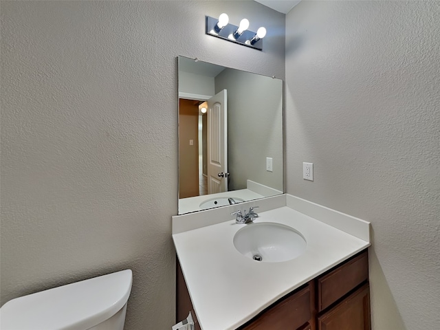 2002 Grimes Dr, Forney, TX 75126 - half bath featuring vanity and toilet