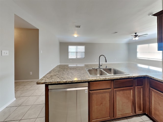 2002 Grimes Dr, Forney, TX 75126 - kitchen with dishwasher, a sink, light tile patterned flooring, and ceiling fan