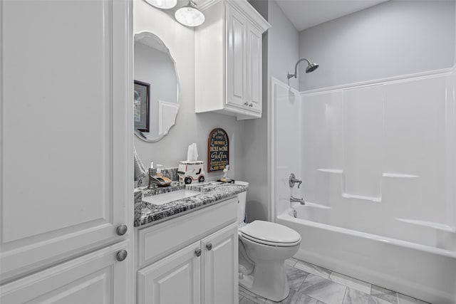 full bathroom featuring shower / tub combination, vanity, and toilet