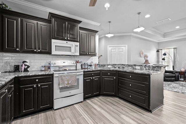 kitchen featuring pendant lighting, white appliances, crown molding, and light wood-type flooring