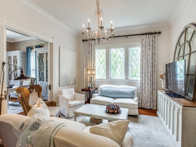 interior space with ornamental molding, an inviting chandelier, and light hardwood / wood-style flooring