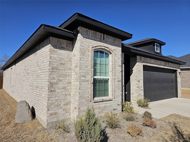 view of property exterior featuring a garage