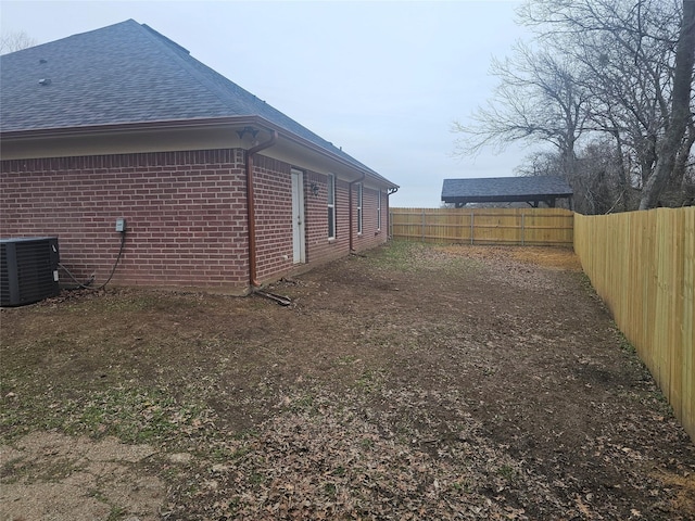 view of property exterior featuring central AC