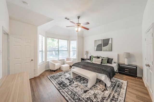 bedroom featuring light hardwood / wood-style flooring and ceiling fan