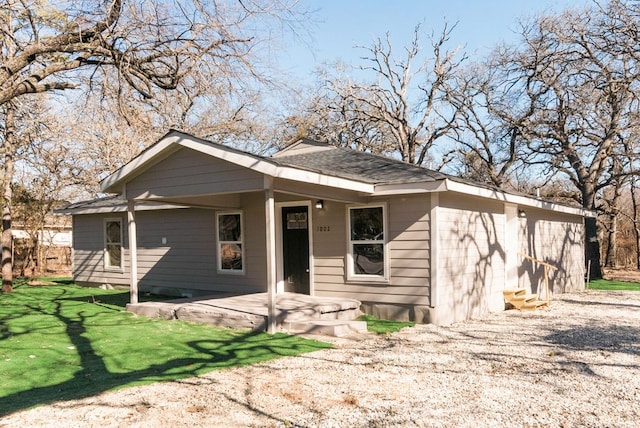 bungalow with a front yard