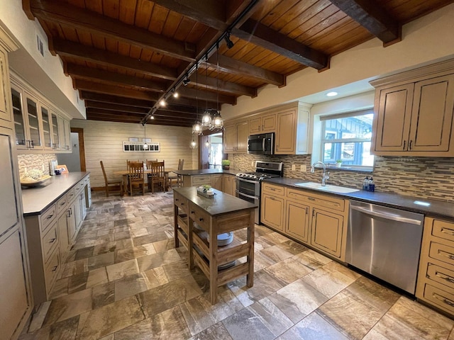 kitchen with pendant lighting, sink, wood ceiling, stainless steel appliances, and track lighting