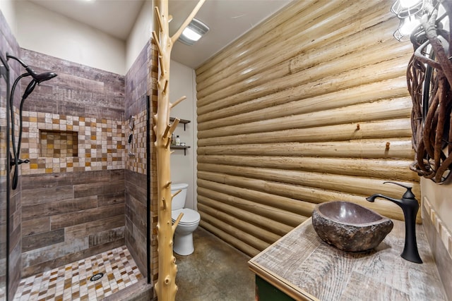 bathroom with walk in shower, rustic walls, and toilet