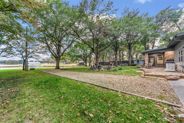 view of yard with a patio area