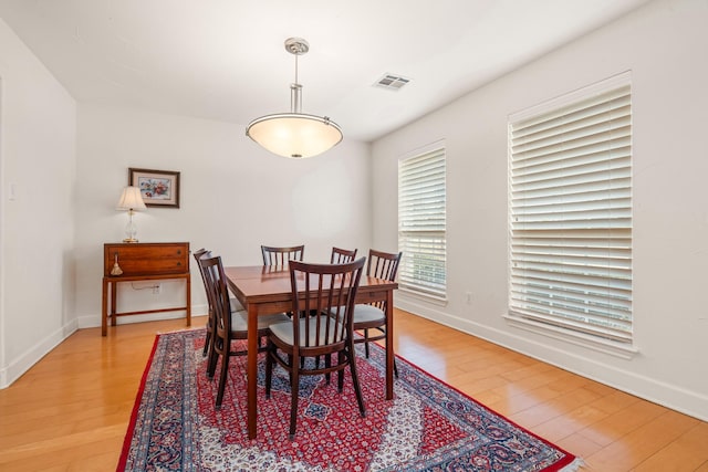 dining room featuring light hardwood / wood-style floors