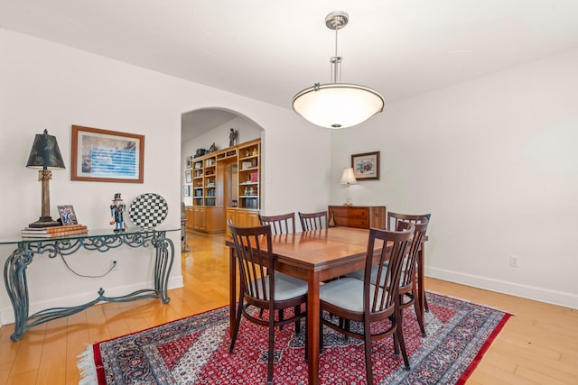 dining area featuring hardwood / wood-style flooring