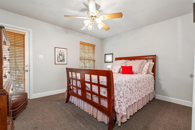 bedroom featuring ceiling fan and dark carpet