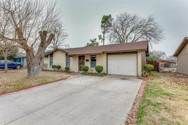 view of front of home with a garage and a front yard