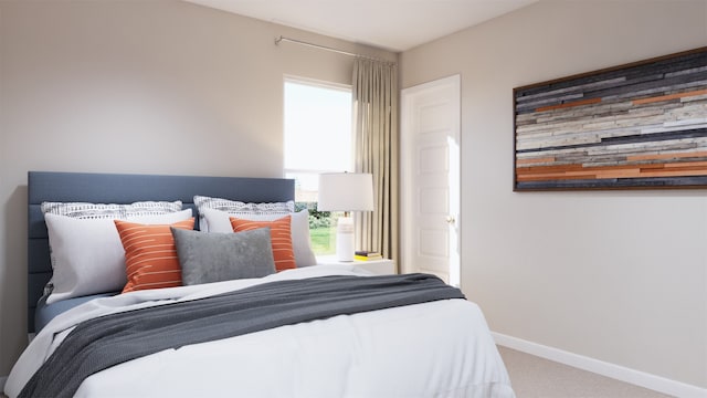 bedroom with carpet flooring and baseboards