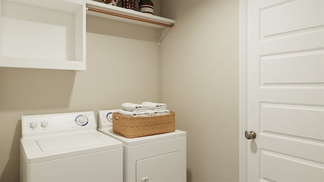 laundry room with laundry area and washing machine and dryer