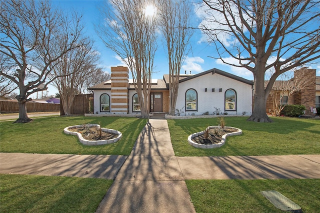 view of front of home with a front yard