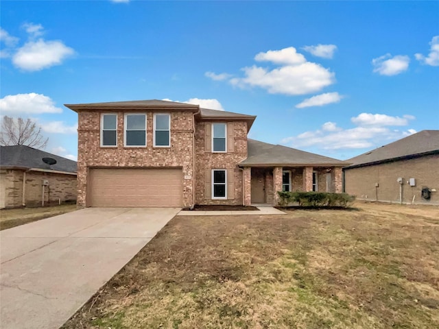 view of front of property with a garage and a front yard