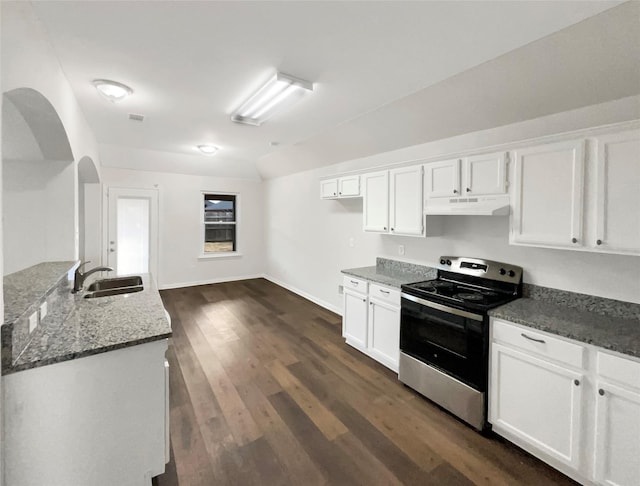 kitchen with sink, white cabinetry, dark stone countertops, dark hardwood / wood-style flooring, and stainless steel electric stove