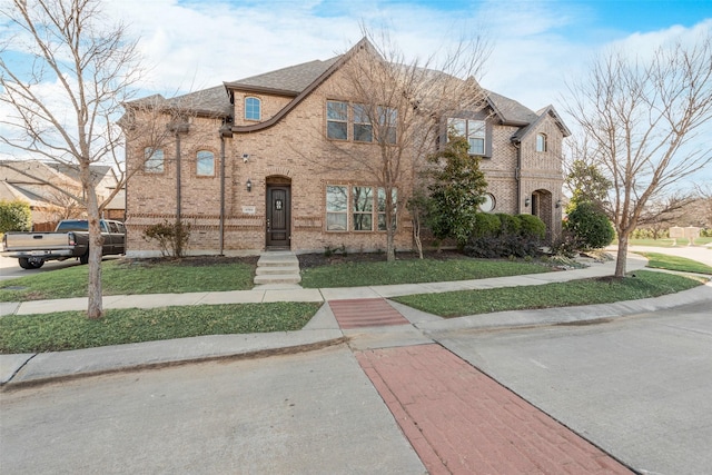 view of front of home with a front yard