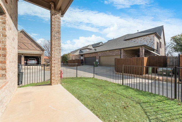 view of yard with a garage