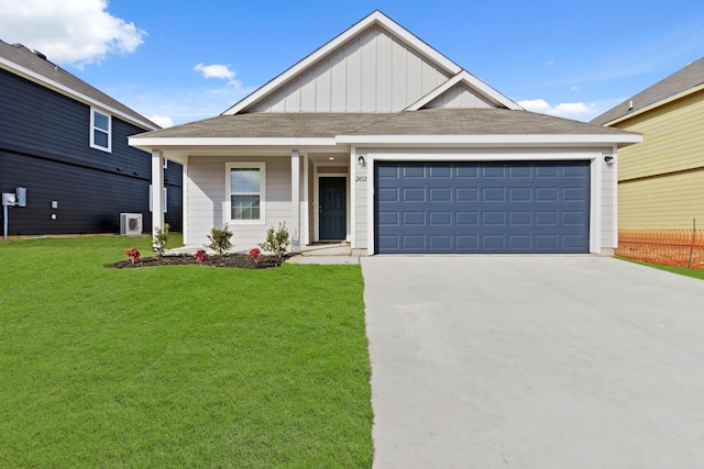 view of front facade with a garage and a front yard