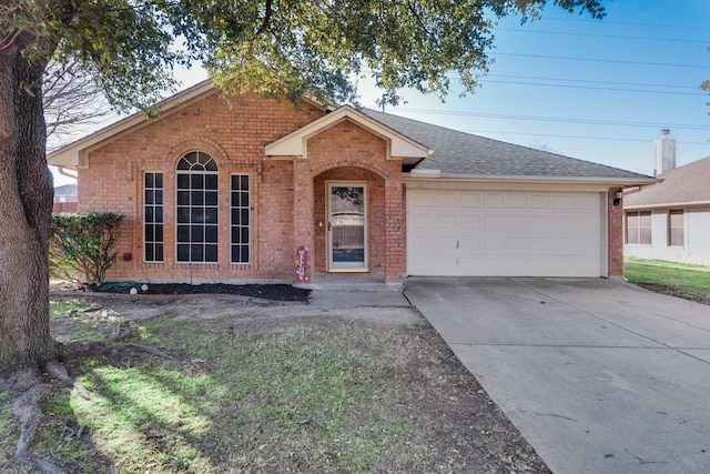 ranch-style house featuring a garage