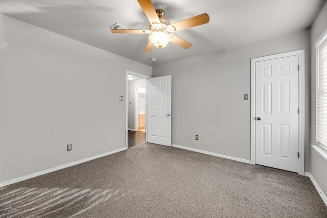 unfurnished bedroom featuring ceiling fan and carpet flooring