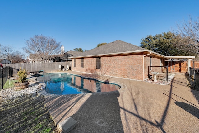 view of pool featuring a patio