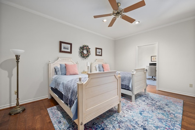 bedroom featuring crown molding, dark wood-type flooring, and ceiling fan