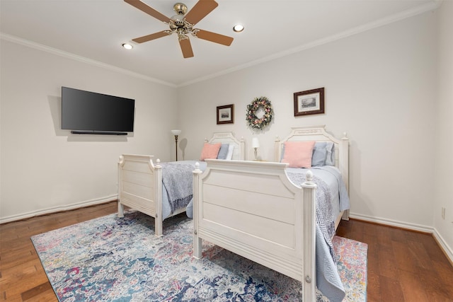 bedroom with crown molding, dark wood-type flooring, and ceiling fan