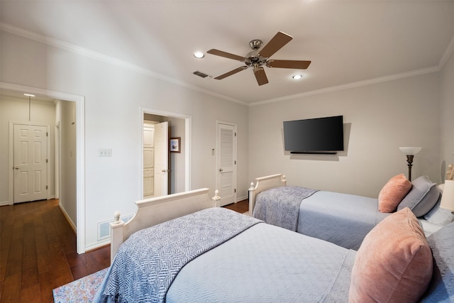 bedroom with ceiling fan, ornamental molding, and dark hardwood / wood-style floors