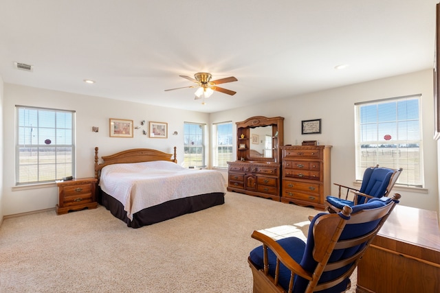 carpeted bedroom with ceiling fan